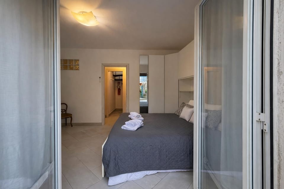 Bed, Photo of the whole room, Bedroom, towels, wardrobe