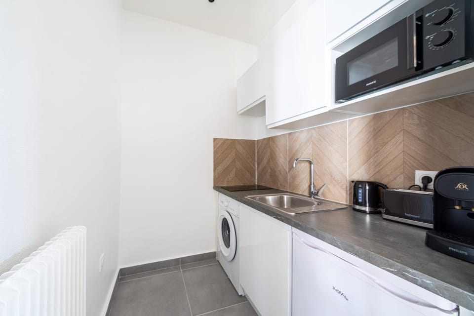 Coffee/tea facilities, Kitchen or kitchenette, microwave, toaster, washing machine