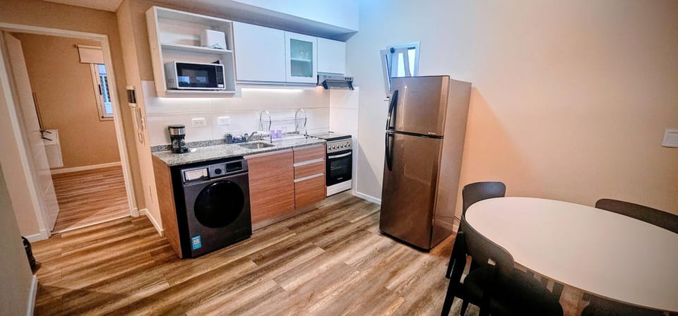 Kitchen or kitchenette, microwave, oven, stove