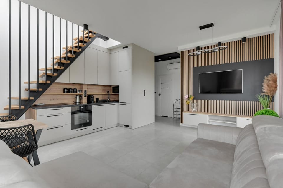TV and multimedia, Kitchen or kitchenette, Living room, Seating area, dishwasher, oven, stove