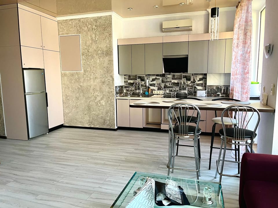 Kitchen or kitchenette, Living room, Seating area, Dining area, dishwasher, minibar, oven, stove, air conditioner