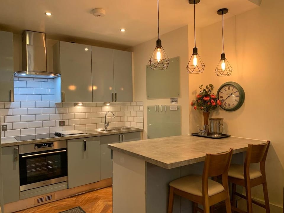 Kitchen or kitchenette, Dining area, dishwasher, microwave, oven, stove, washing machine, dryer