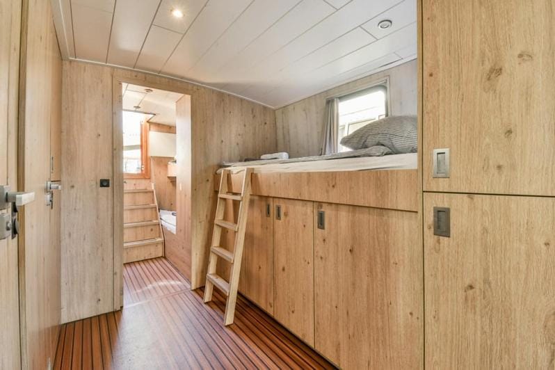 Unique houseboat city center 'Greuns' Docked boat in Amsterdam