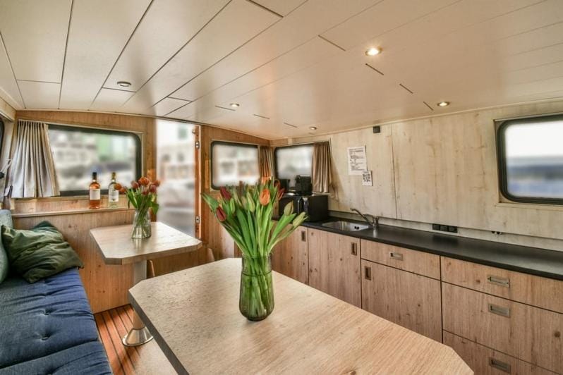 Unique houseboat city center 'Greuns' Docked boat in Amsterdam
