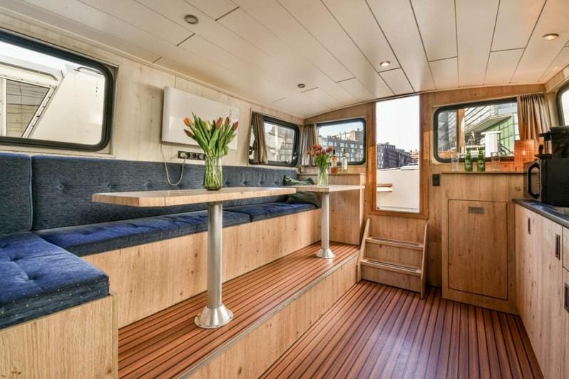 Unique houseboat city center 'Greuns' Docked boat in Amsterdam