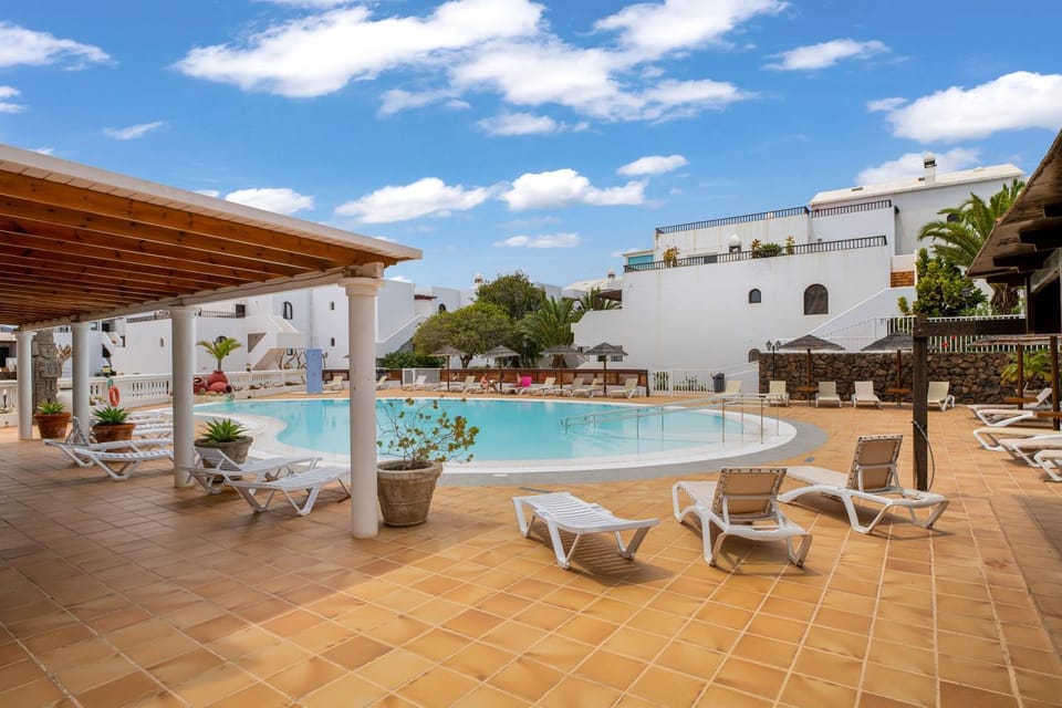 Property building, Living room, Swimming pool