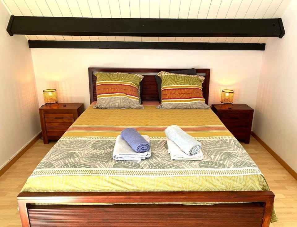 Photo of the whole room, Bedroom, towels, air conditioner