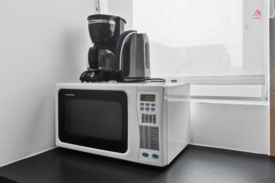 Coffee/tea facilities, Kitchen or kitchenette, oven