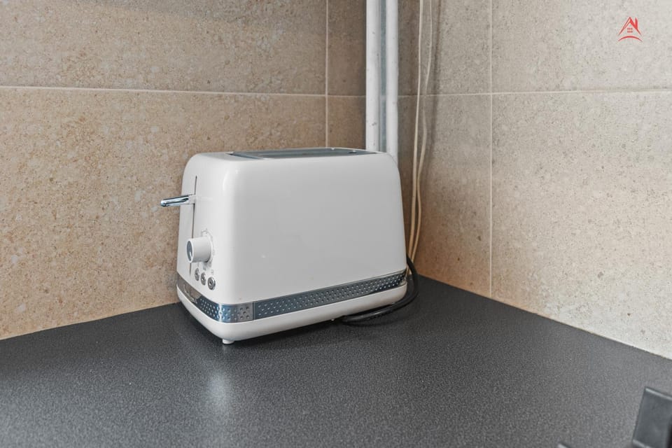 Kitchen or kitchenette, toaster