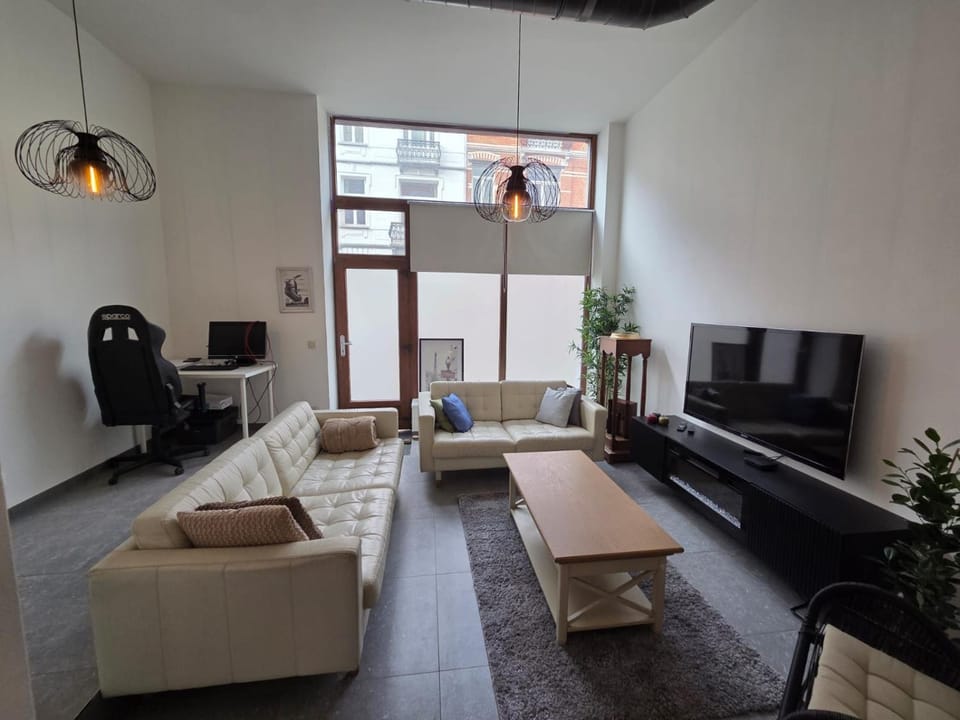 Industrial-Style Loft with Mezzanine Bedroom in Prime Area Apartment in Ixelles