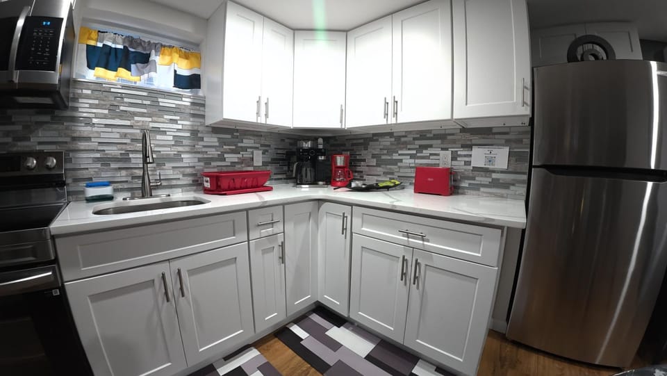Kitchen or kitchenette, oven, stove, toaster