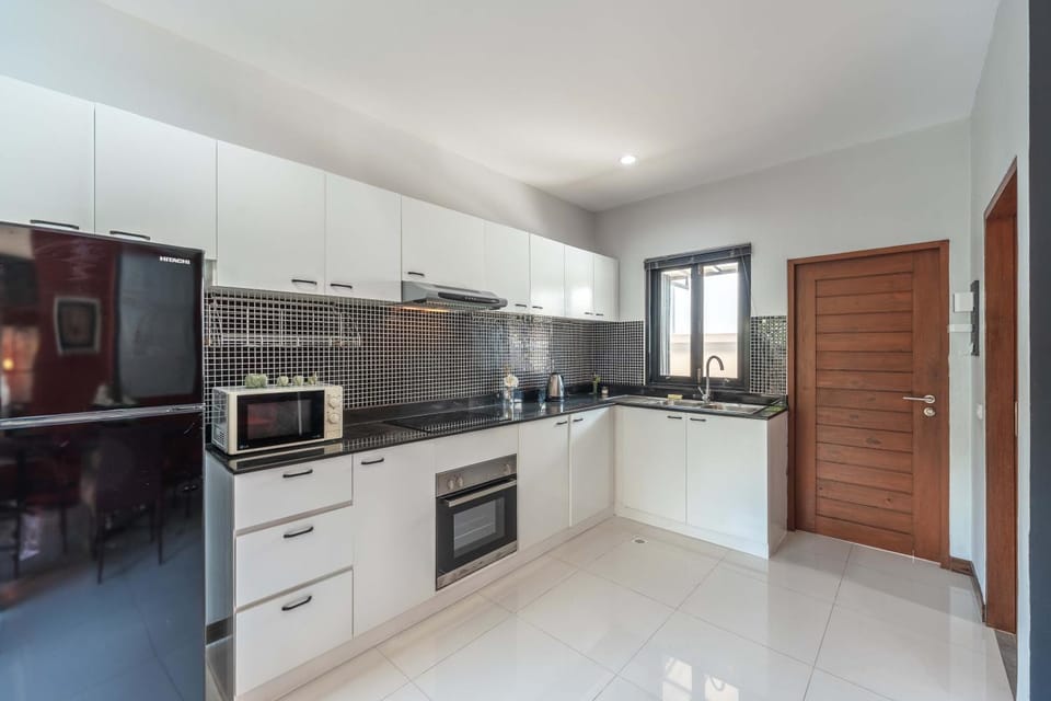 Kitchen or kitchenette, oven, stove, toaster