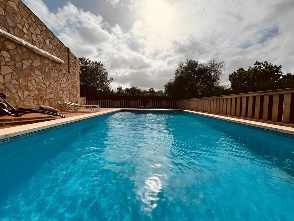 Property building, Living room, Swimming pool