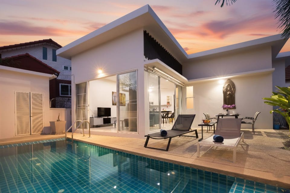 Property building, Patio, Living room, Seating area, Pool view, Swimming pool, sunbed