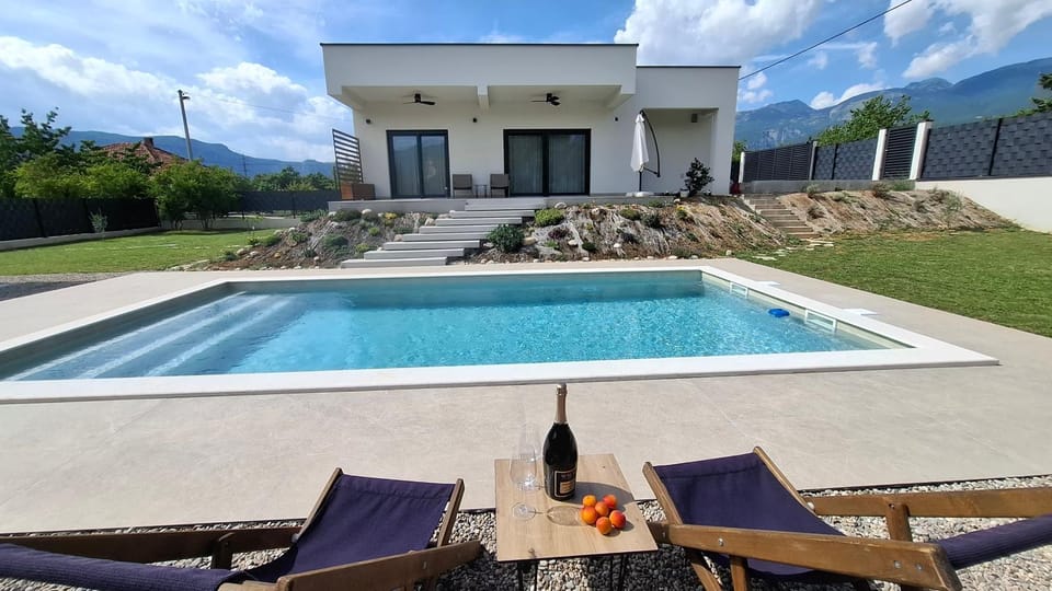 Property building, Day, Natural landscape, Garden, Garden view, Pool view, Swimming pool