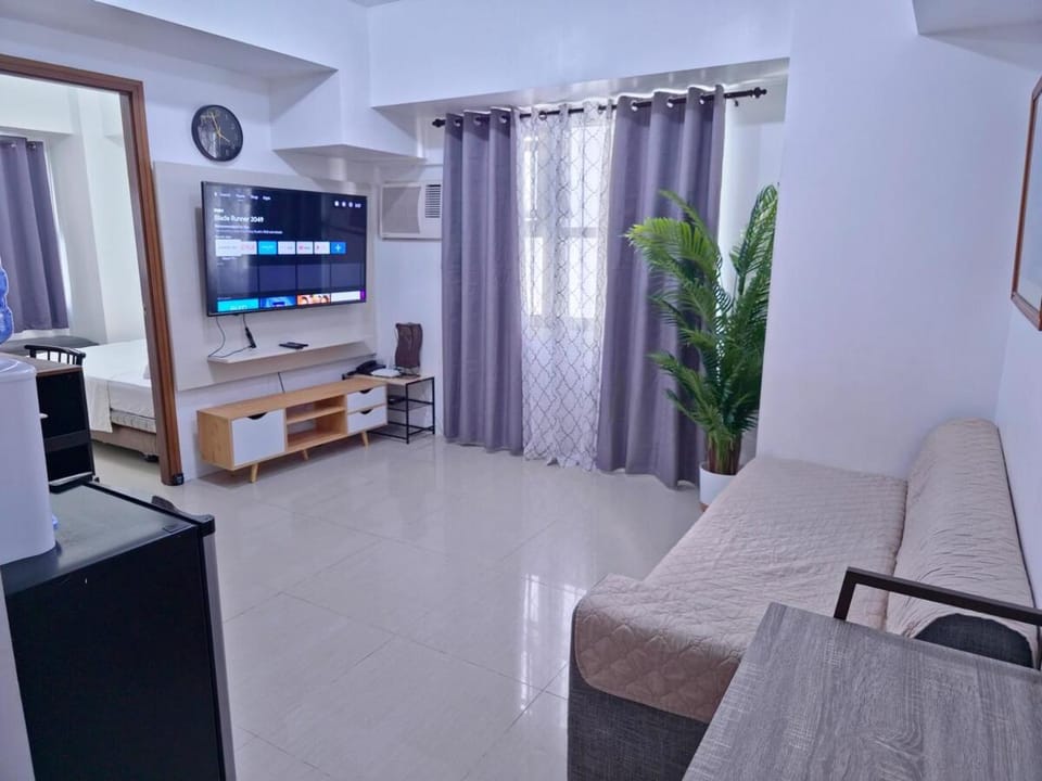 1 BR corner unit 55inches TV at Horizons 101 Apartment in Lapu-Lapu City