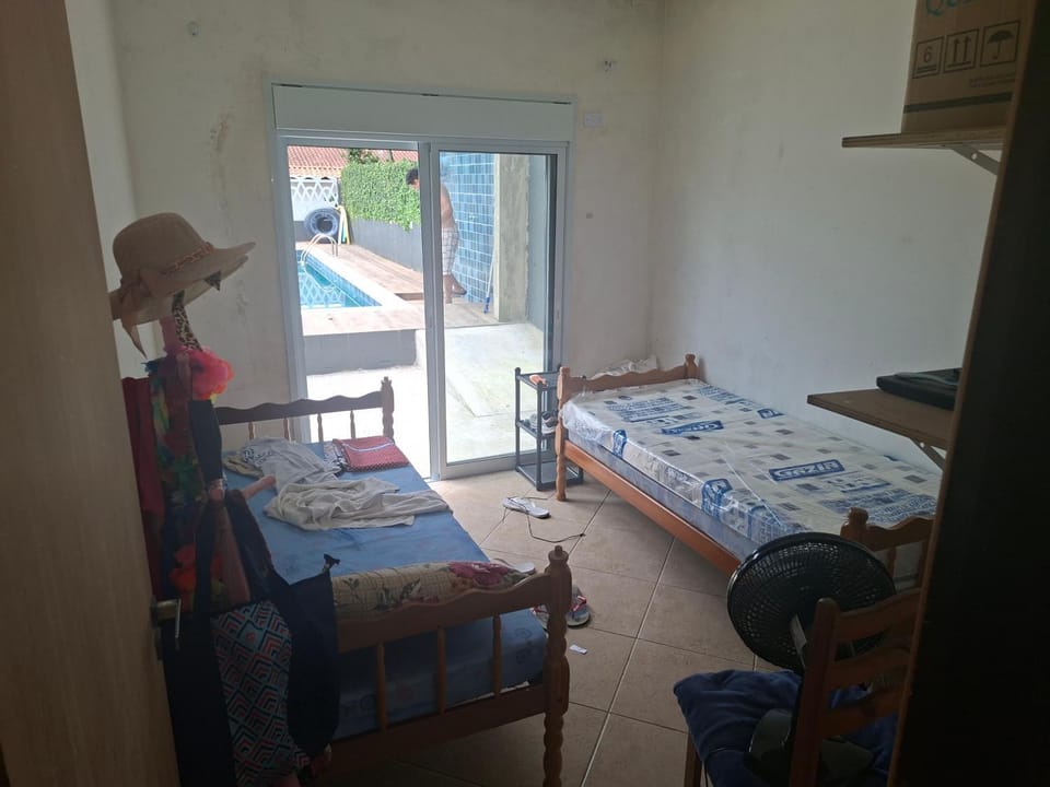Canto da praia com piscina House in Itanhaém