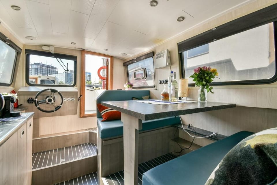 New houseboat city center 'Cruijff' Docked boat in Amsterdam