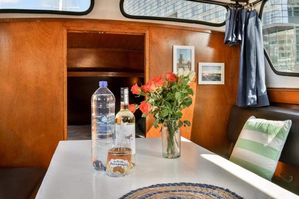 Local houseboat city center 'Betelgeuze' Docked boat in Amsterdam