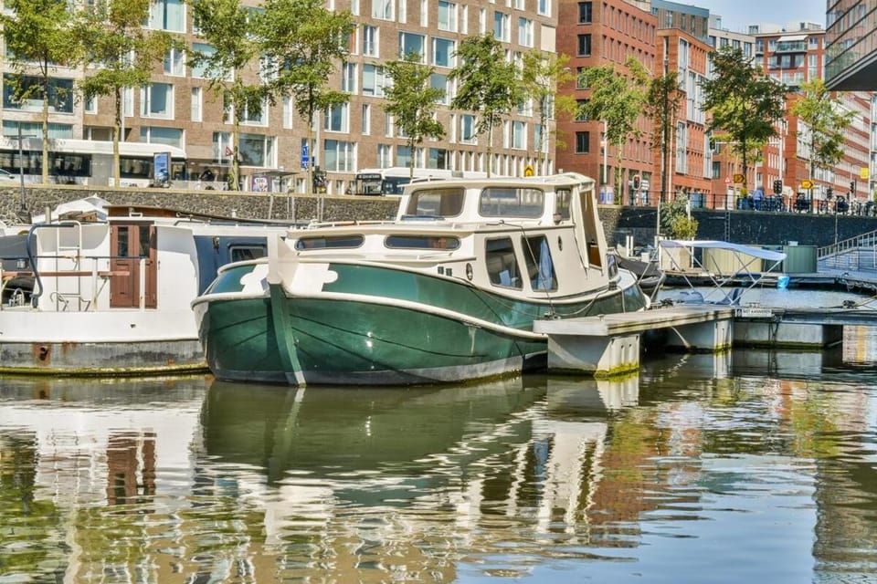 Local houseboat city center 'Capella' Docked boat in Amsterdam