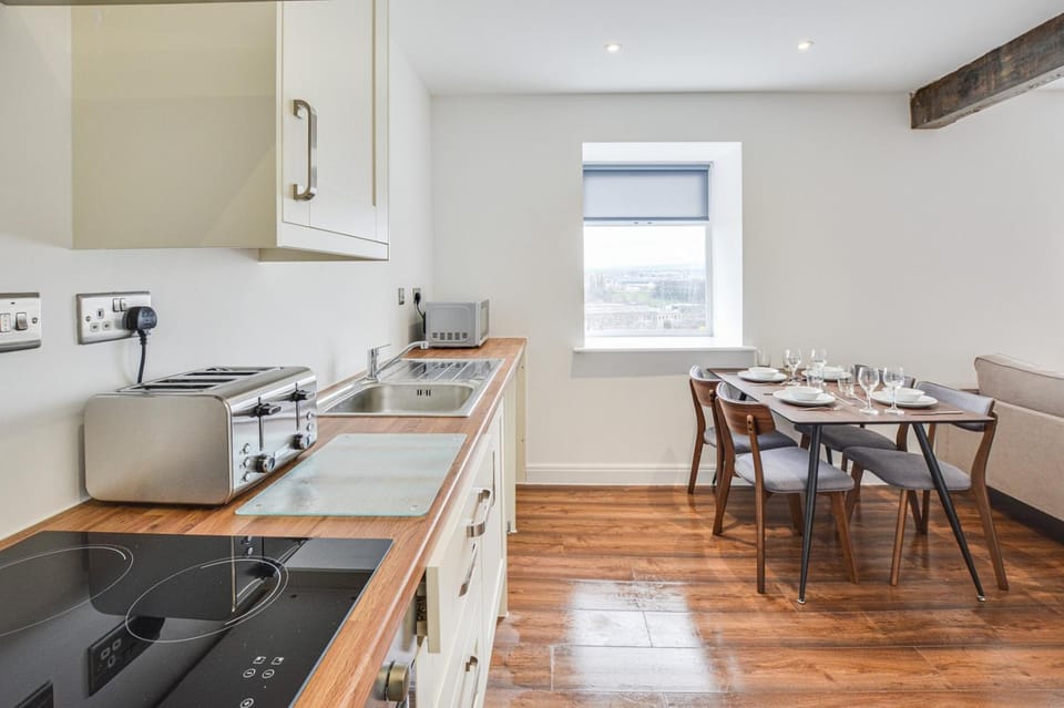 Kitchen or kitchenette, Living room, Seating area, Dining area, oven, stove, toaster