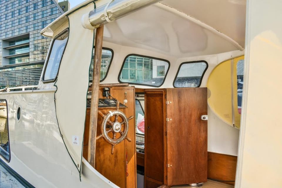Houseboat center amsterdam 'Messi' Docked boat in Amsterdam