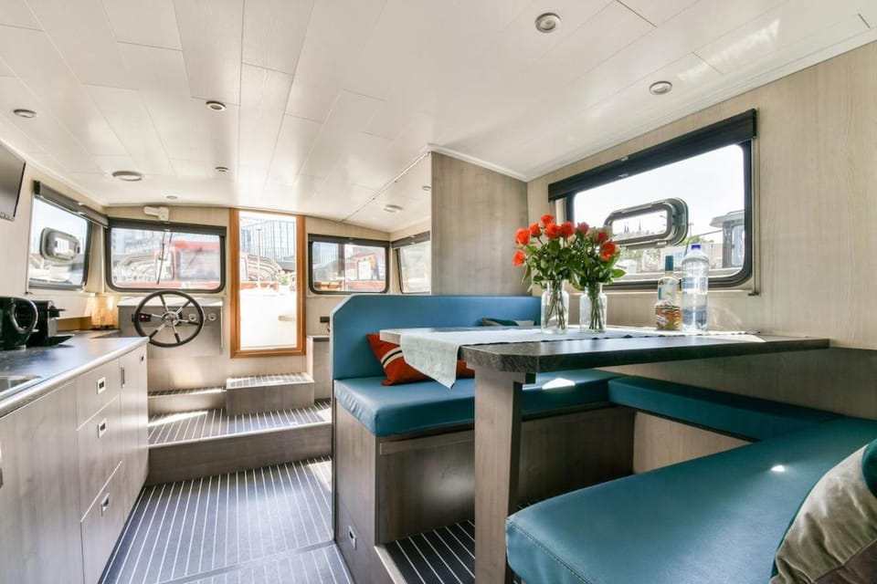 Brand new boat city center Amsterdam 'Dolte' Docked boat in Amsterdam