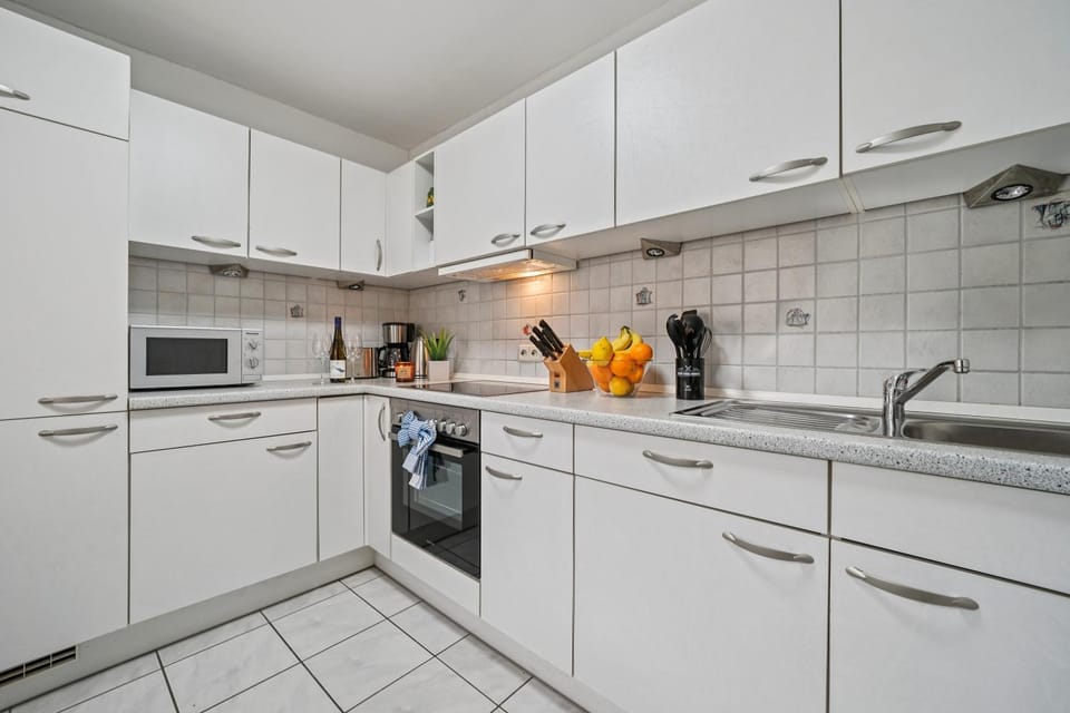 Kitchen or kitchenette, oven, stove