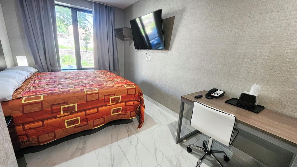 Bed, TV and multimedia