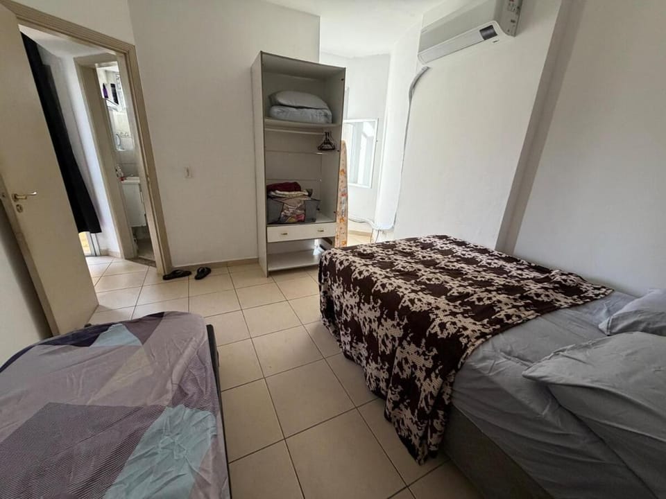 Apartamento centro de Sv, garagem, ar, elevador à 1 quadra da praia Apartment in Santos