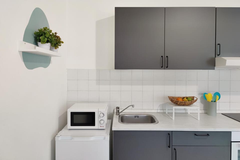 Kitchen or kitchenette, stove