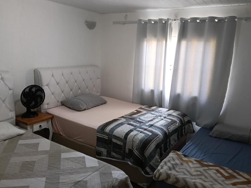 Casa Amarela House in São José dos Pinhais