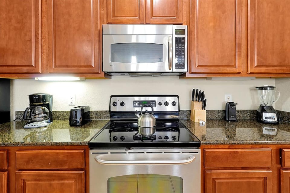 Kitchen or kitchenette, microwave, oven, stove, kitchen