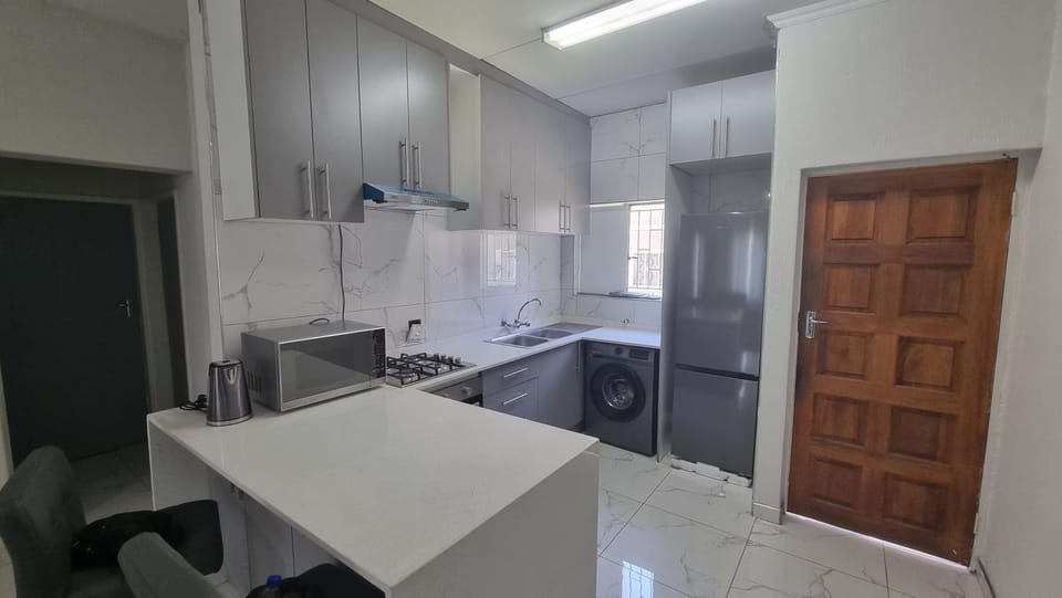 Kitchen or kitchenette, oven, stove