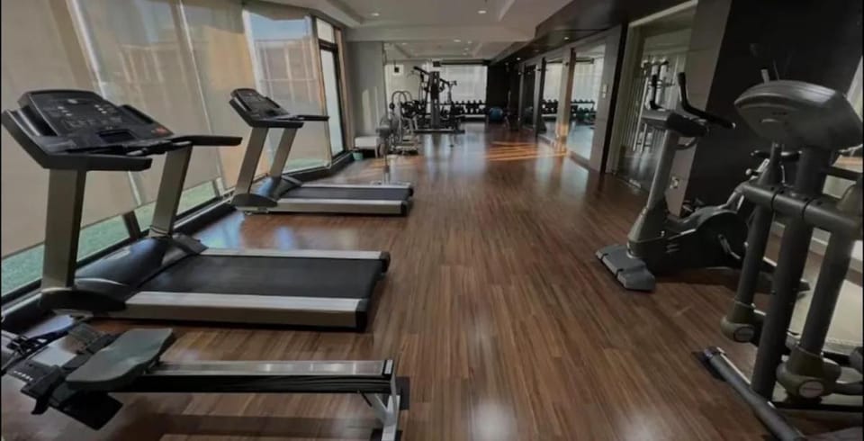 Large 6 Pax Bedroom with 3 Beds and Balcony next to Nana BTS Apartment in Bangkok