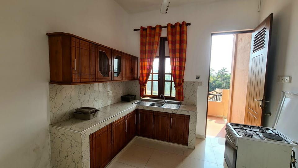 Kitchen or kitchenette, oven, stove