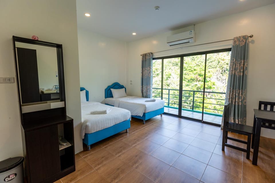 Bed, Photo of the whole room, Bedroom, towels, air conditioner