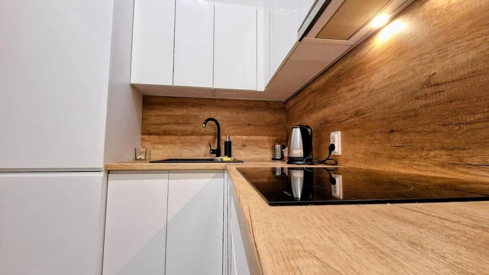 Kitchen or kitchenette, microwave, stove