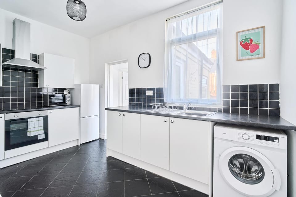 Kitchen or kitchenette, microwave, oven, stove, toaster, kitchen