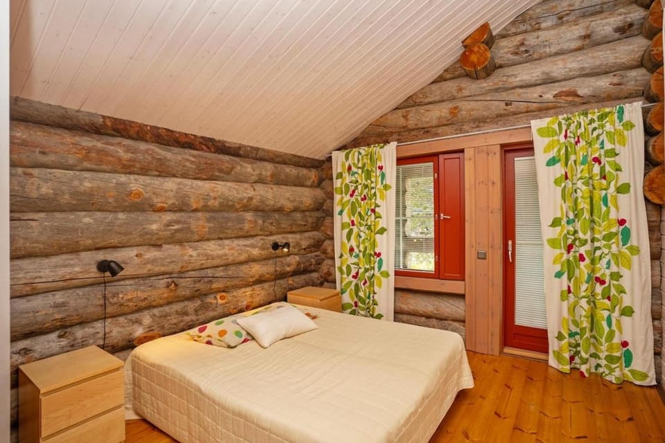 Naava - Pine log on Utsuvaara fell in Levi Villa in Lapland