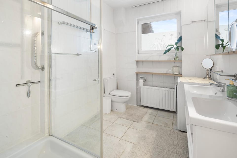 Shower, Toilet, Bathroom, towels, washing machine, dryer