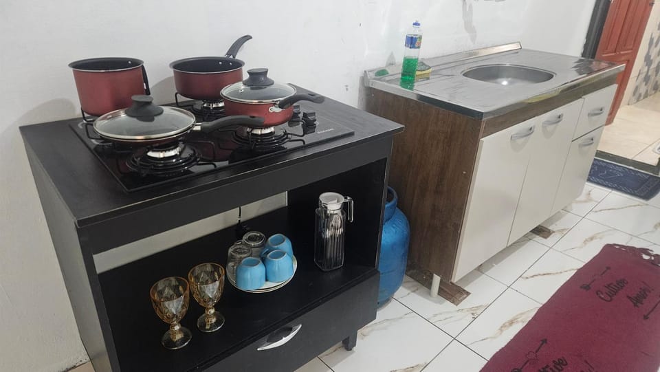 Kitchen or kitchenette, stove