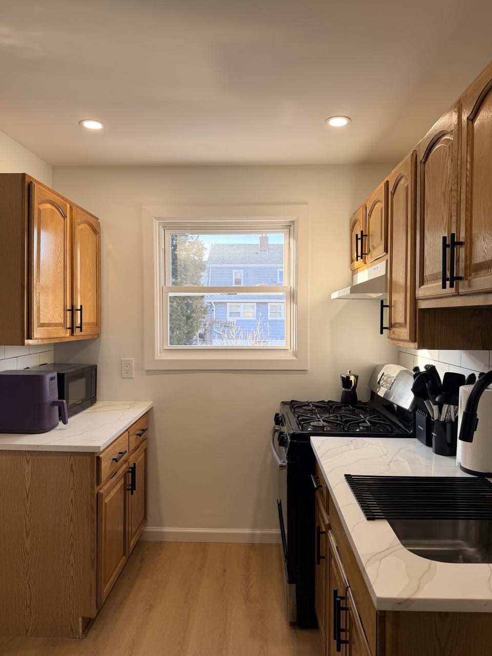 Kitchen or kitchenette, storage, stove