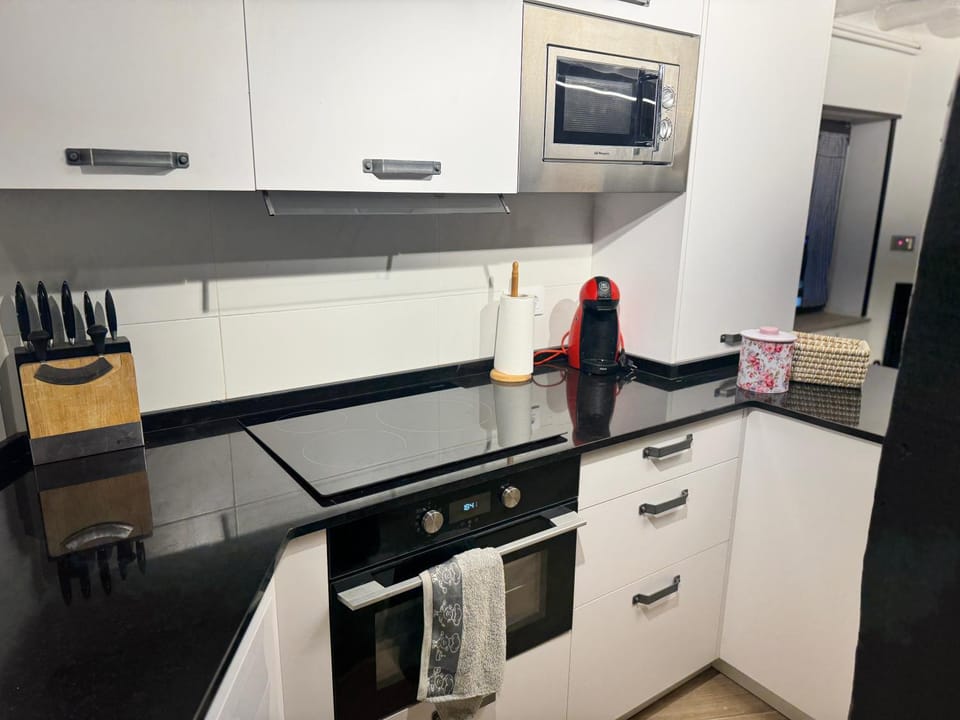 Kitchen or kitchenette, stove