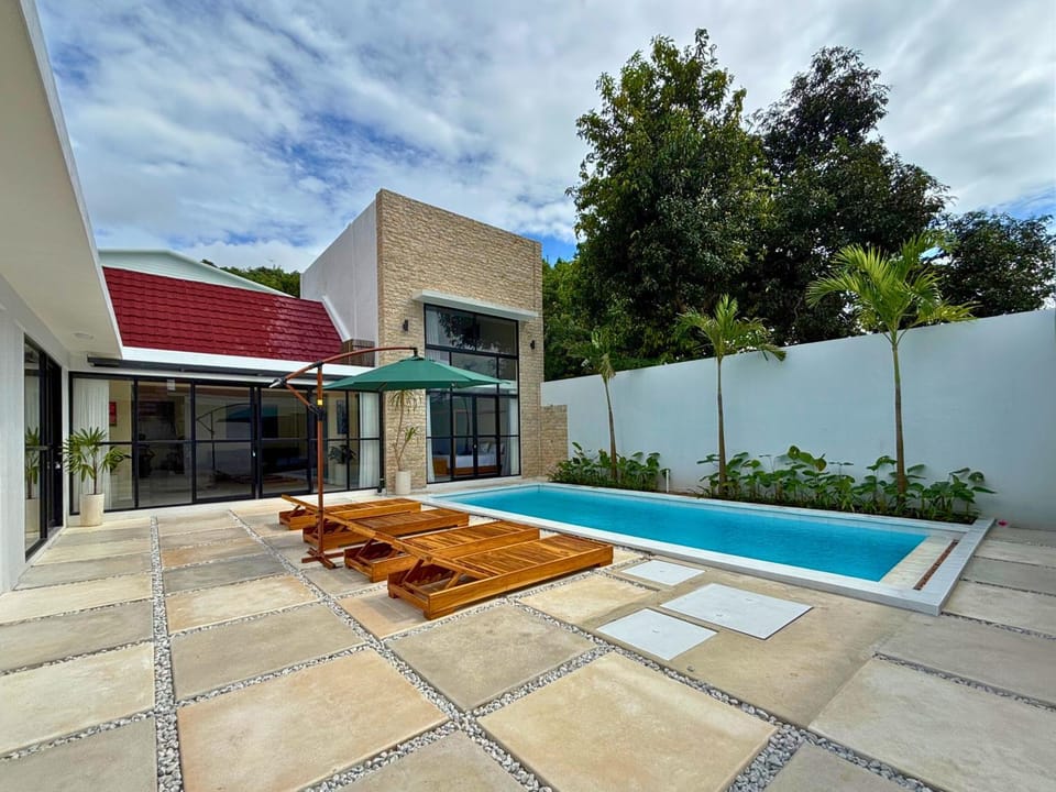 Property building, Pool view, Swimming pool, sunbed