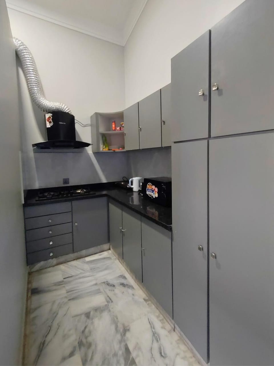 Kitchen or kitchenette, oven, stove