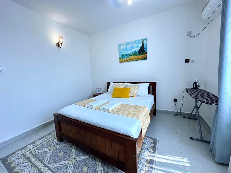 Nyali 2 BR with AC, swimming Pool,Balcony & 3 minutes beach walk Apartment in Mombasa