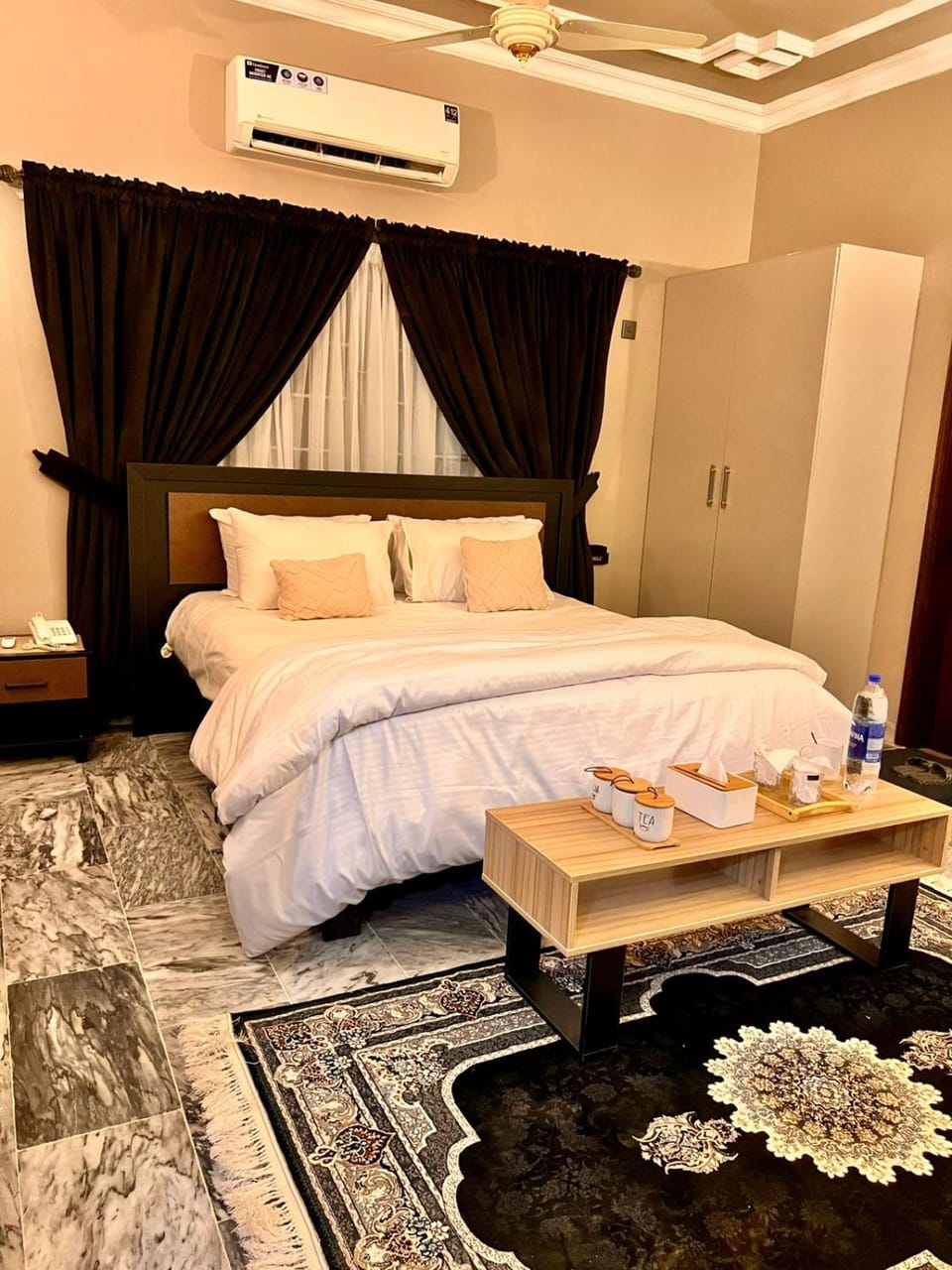 Bed, Living room, Photo of the whole room, Seating area, Bedroom, towels, wardrobe, air conditioner