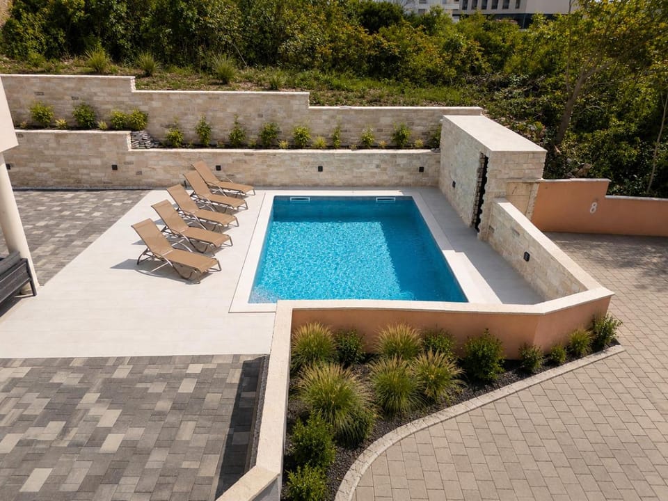 Swimming pool, sunbed