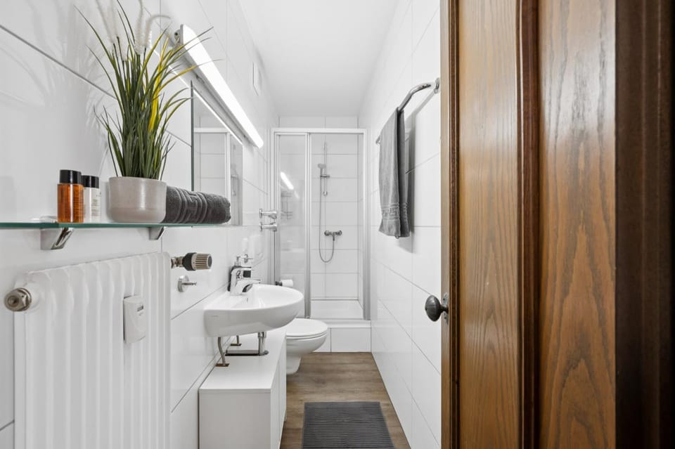 Shower, Toilet, Bathroom, hair dryier, towels